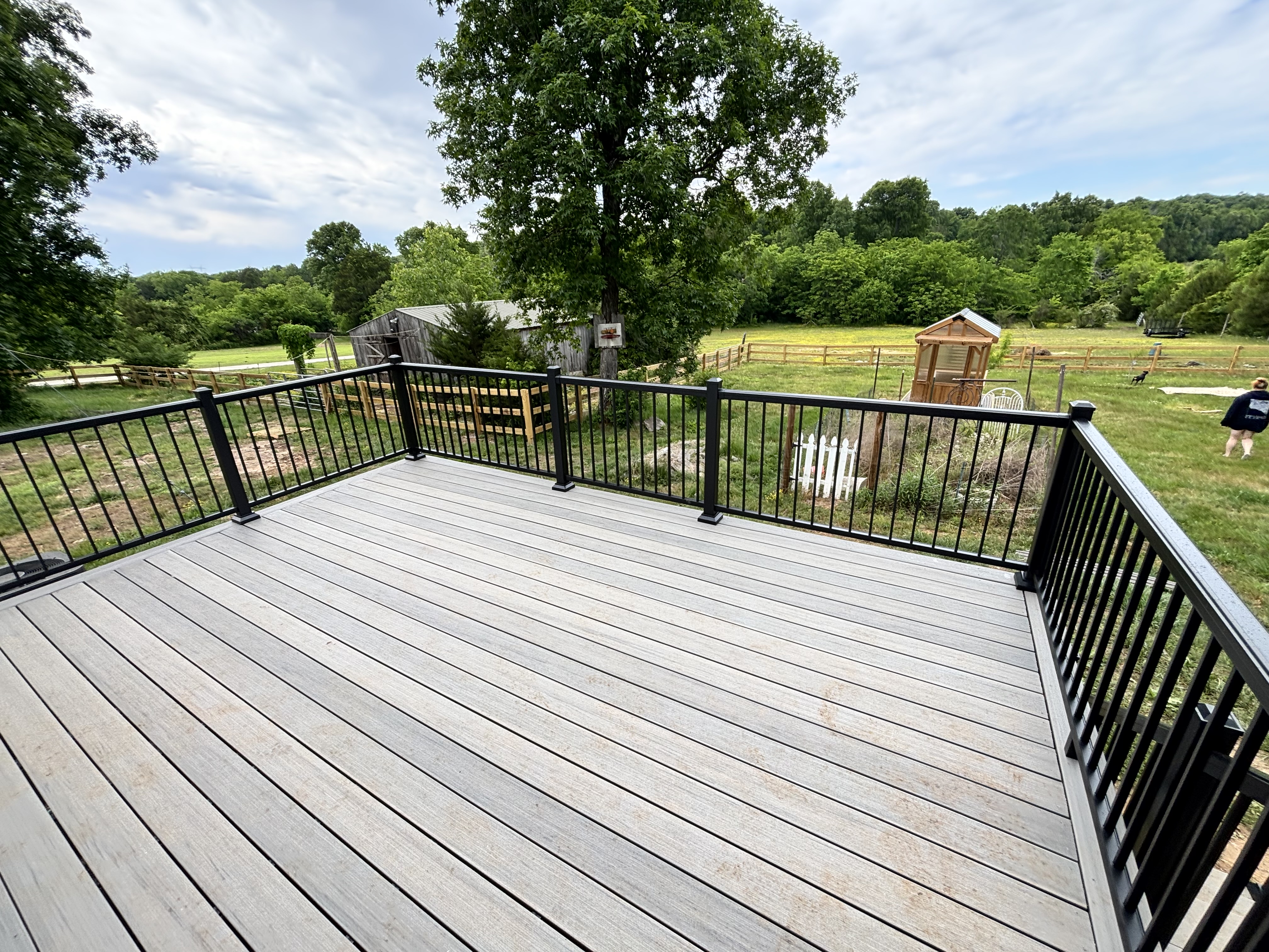 Composite deck with black aluminum railing built by Henning Construction in Middle Tennessee