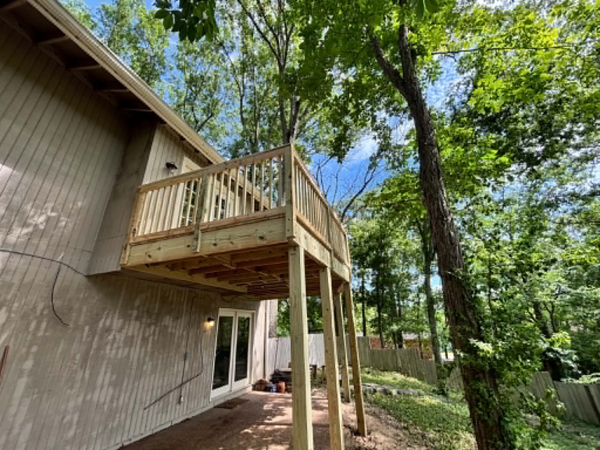 Elevated two-story deck with staircase built by Henning Construction in Middle Tennessee